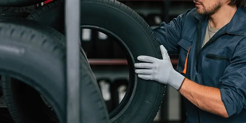 Mechanic working on tire