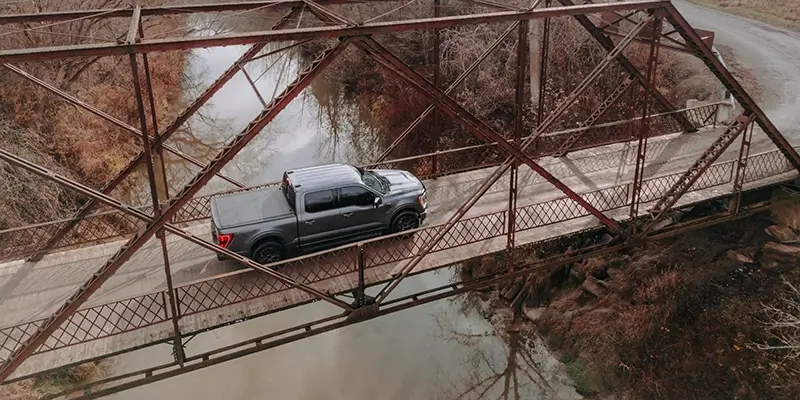 Truck crossing a bridge